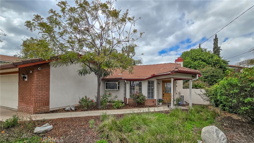 11357 Gramercy Place Riverside, CA 92505 - Photo 50 of 65 Front of house path to the front door