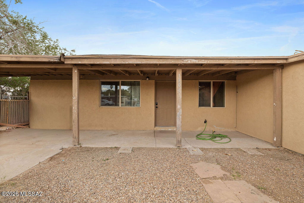 1301 West Kleindale Road Tucson, AZ 85705 - Photo 1 of 27 a view of a house with porch