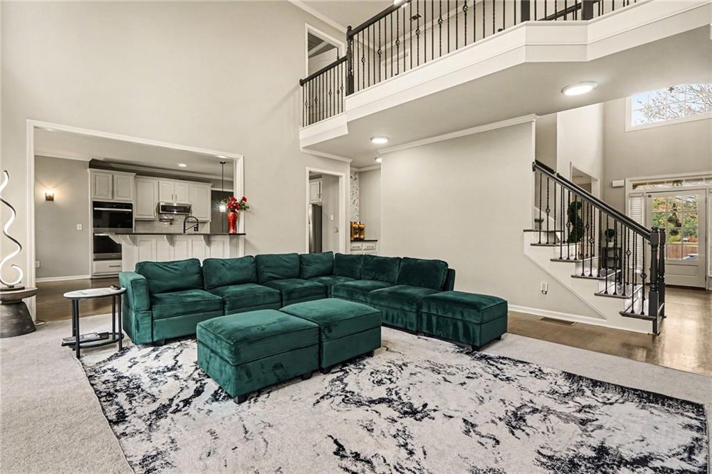 1958 Mapmaker Drive Northeast Dacula, GA 30019 - Photo 11 of 35 a living room with furniture and a rug