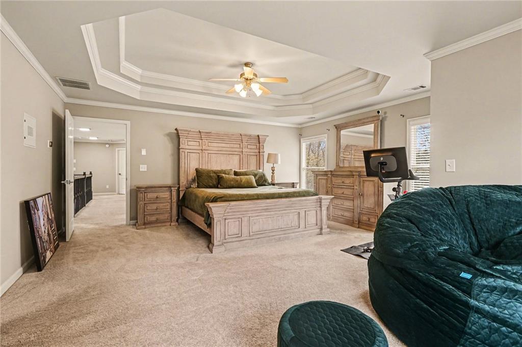 1958 Mapmaker Drive Northeast Dacula, GA 30019 - Photo 17 of 35 a living room with furniture and a flat screen tv