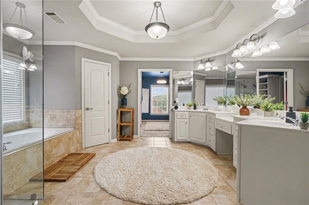 1958 Mapmaker Drive Northeast Dacula, GA 30019 - Photo 18 of 35 a view of a kitchen and dining room