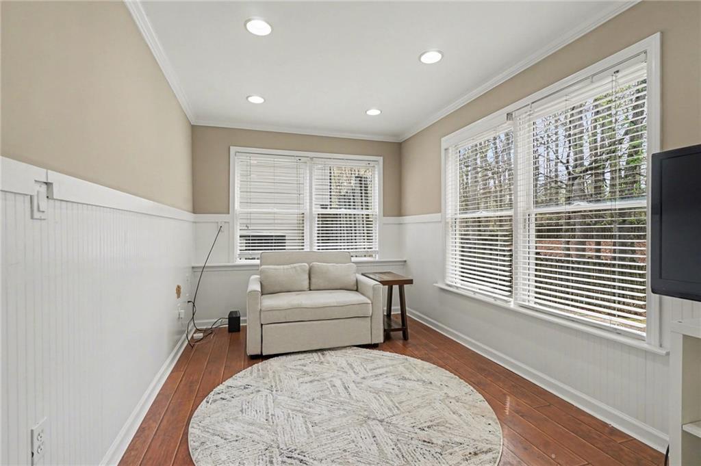1958 Mapmaker Drive Northeast Dacula, GA 30019 - Photo 24 of 35 a living room with furniture and a large window