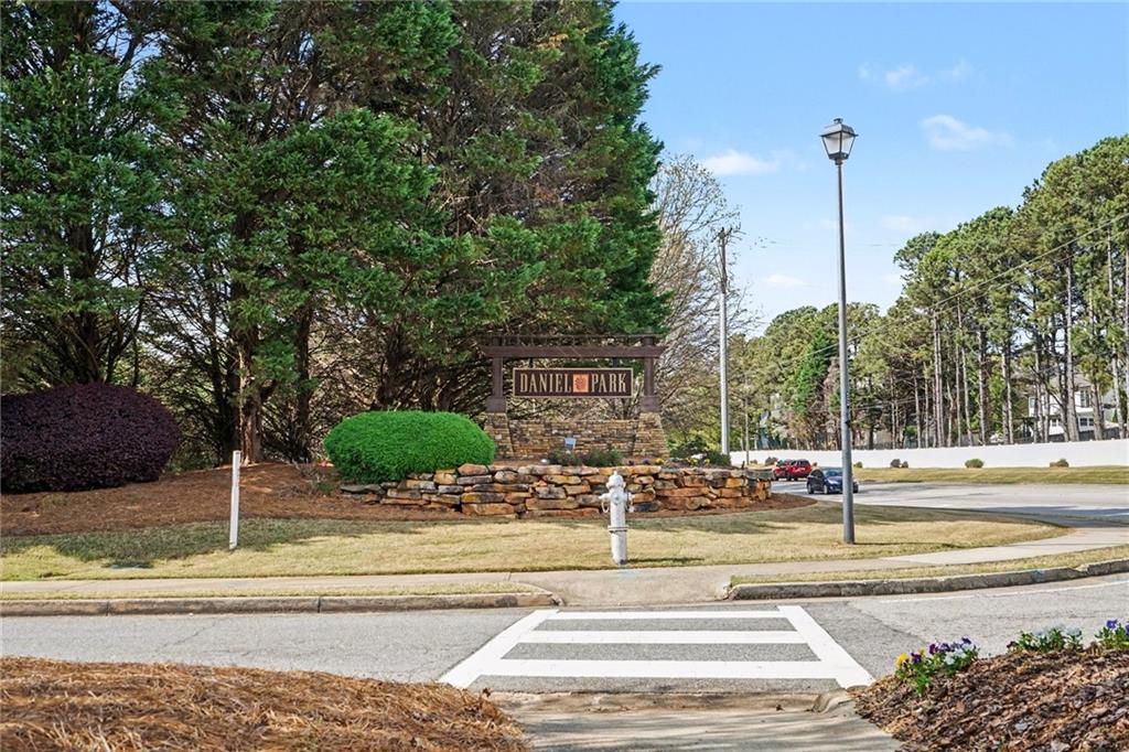 1958 Mapmaker Drive Northeast Dacula, GA 30019 - Photo 33 of 35 a view of a trees in the middle of a yard