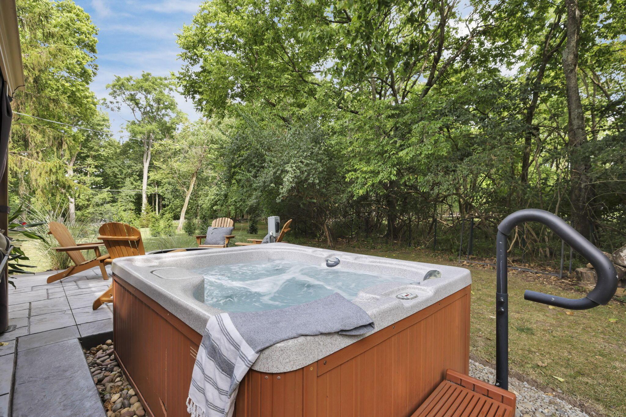 4390 Dublin Road Columbus, OH 43221 - Photo 69 of 83 Hot tub relaxation surrounded by nature.