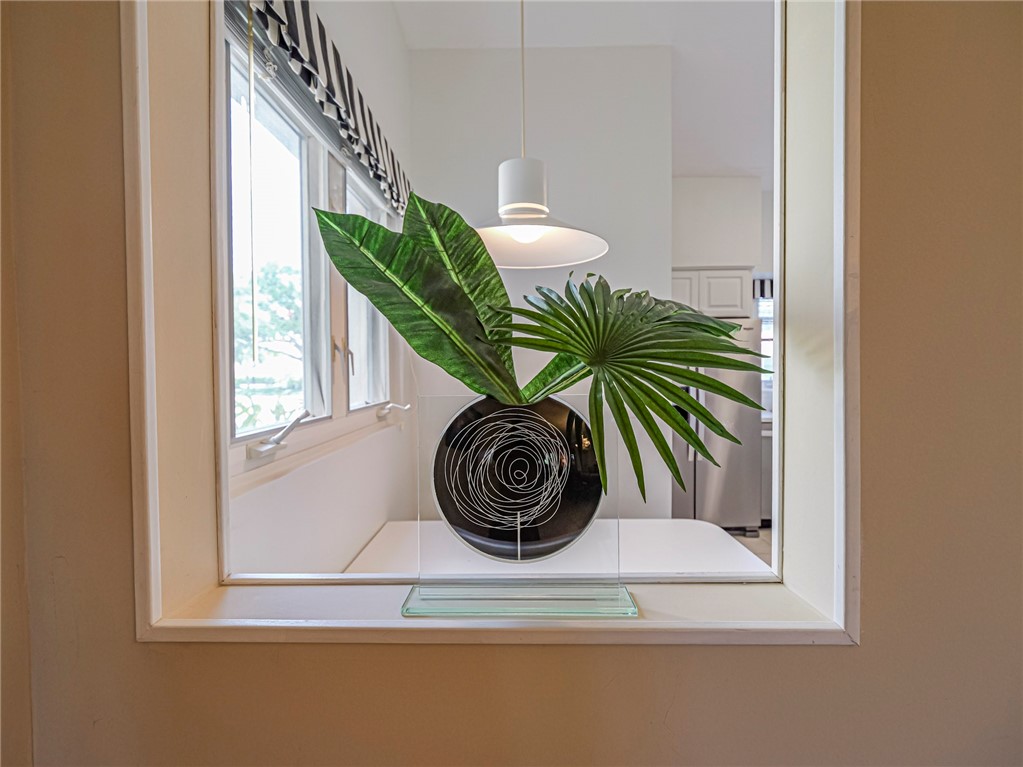 5035 Harmony Circle, Unit 101 Vero Beach, FL 32967 - Photo 14 of 36 a closeup of a window with outer view