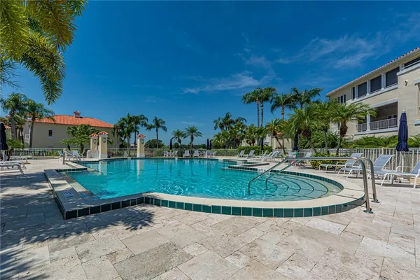 a view of a swimming pool with a patio