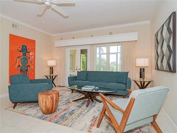 a living room with furniture and a window