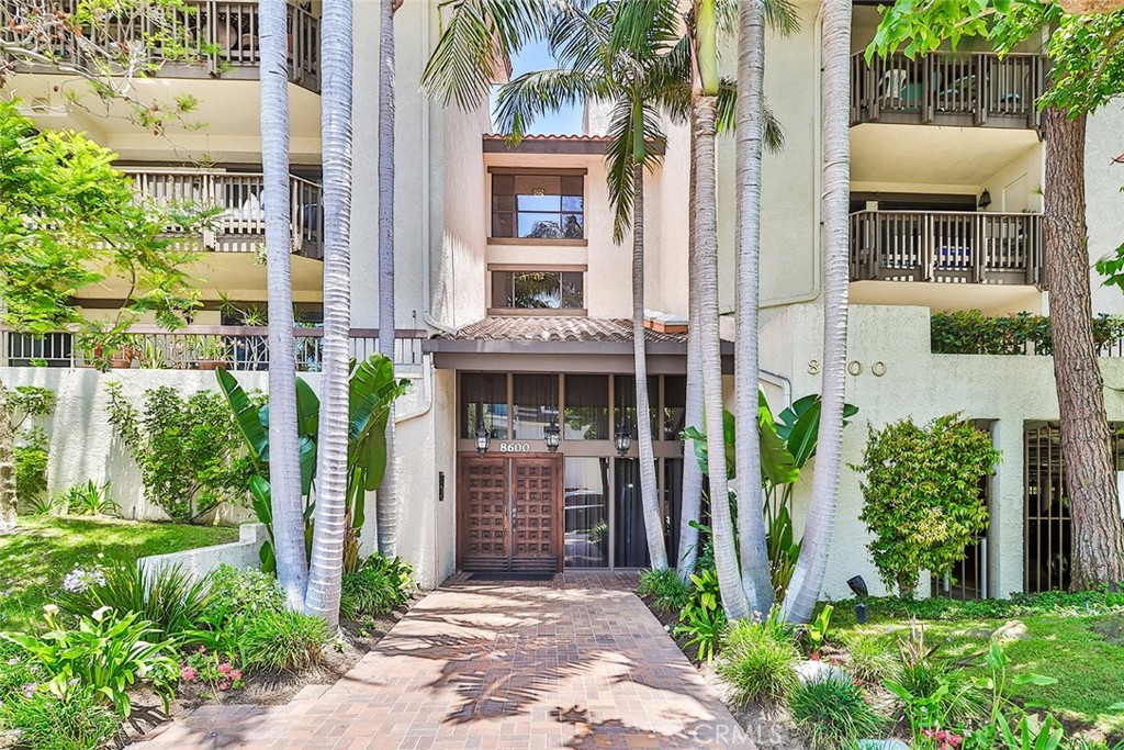 8600 Tuscany Avenue, Unit 413 Playa del Rey, CA 90293 - Photo 1 of 1 front view of house with a yard and potted plants