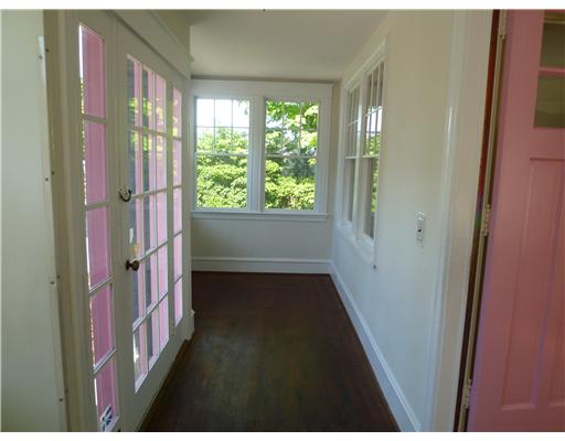 15 Ellery Road Newport, RI 02840 - Photo 11 of 19 Entry. this is the enclosed front porch with front door to the left and interior front door to the right.