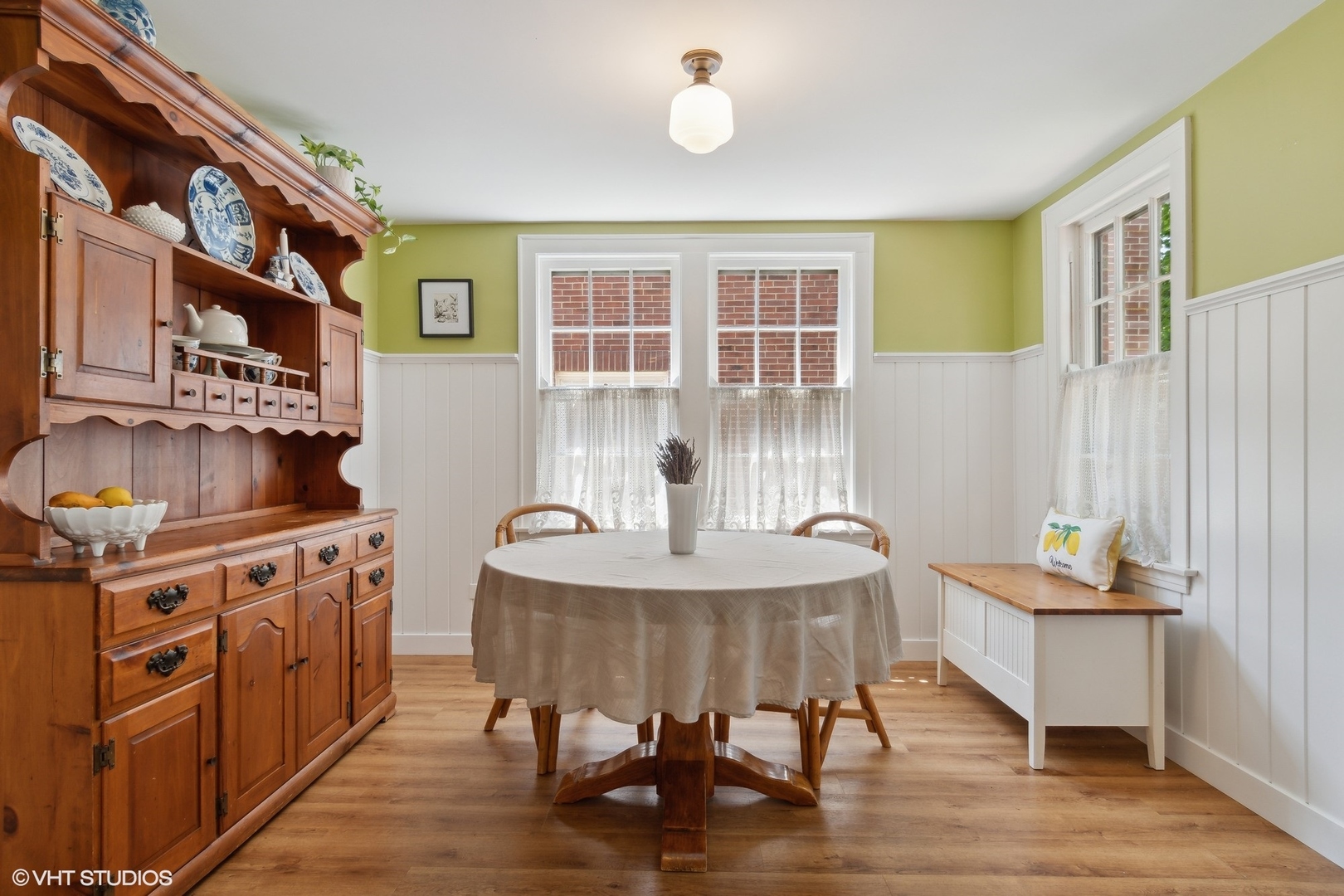 414 Audubon Road Riverside, IL 60546 - Photo 16 of 51 a dining room with furniture and wooden floor