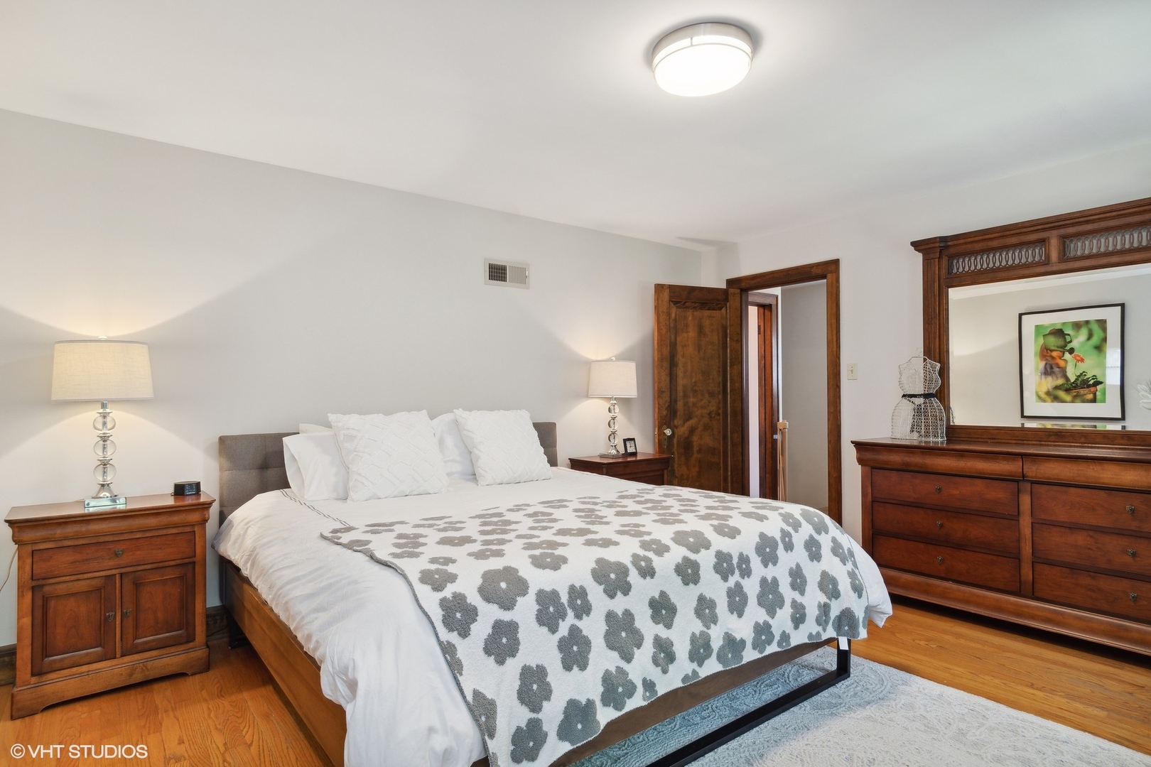 414 Audubon Road Riverside, IL 60546 - Photo 24 of 51 a bedroom with a bed and a dresser