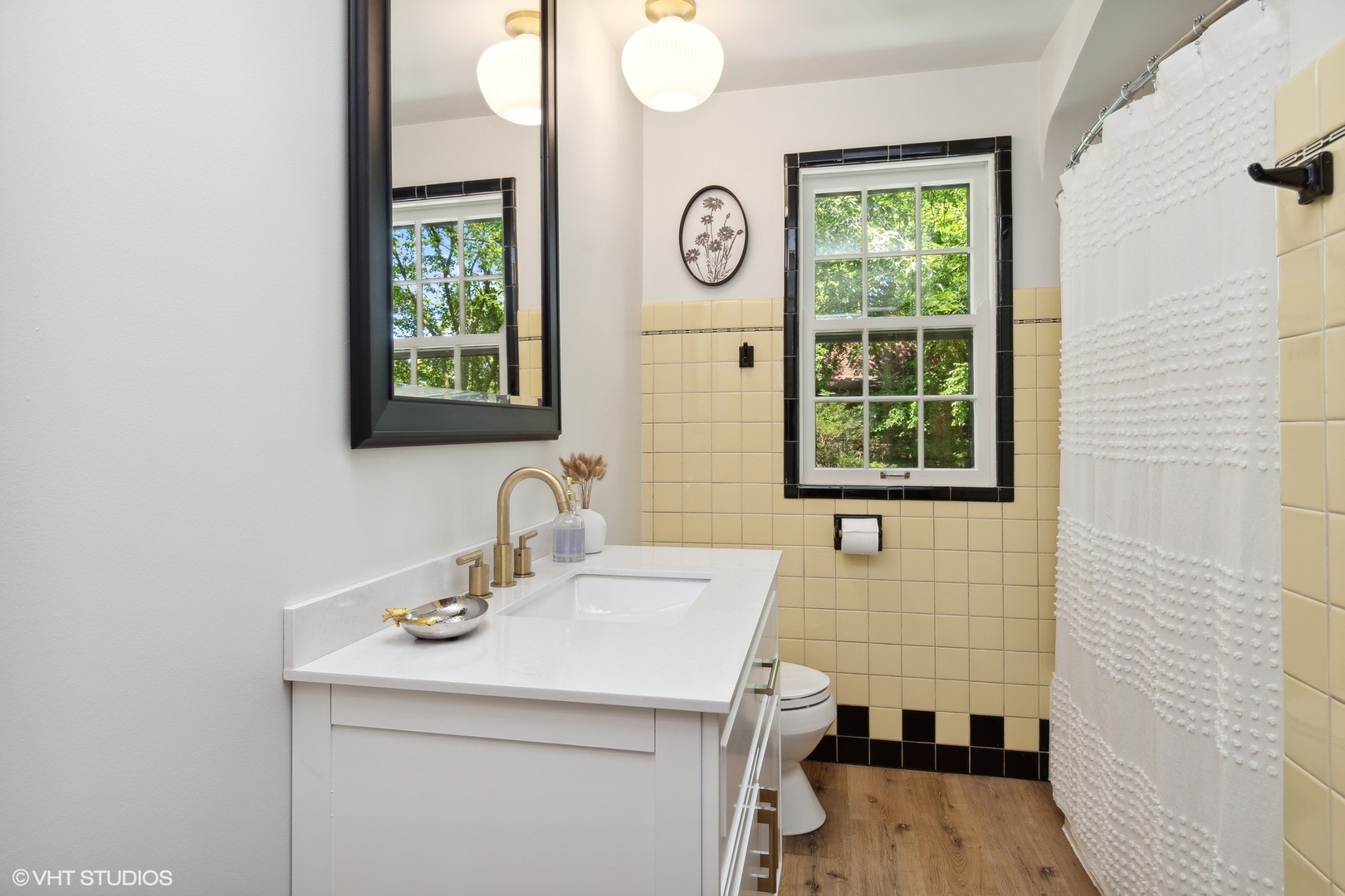 414 Audubon Road Riverside, IL 60546 - Photo 30 of 51 a bathroom with a sink a vanity and a mirror