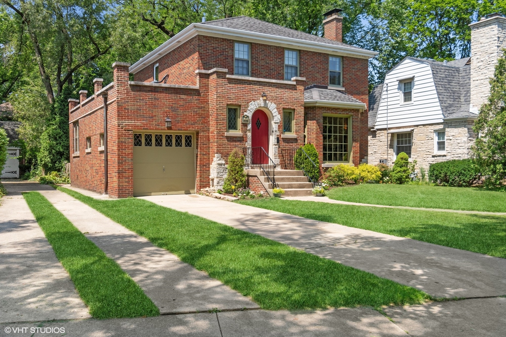 414 Audubon Road Riverside, IL 60546 - Photo 3 of 51 a front view of a house with a yard