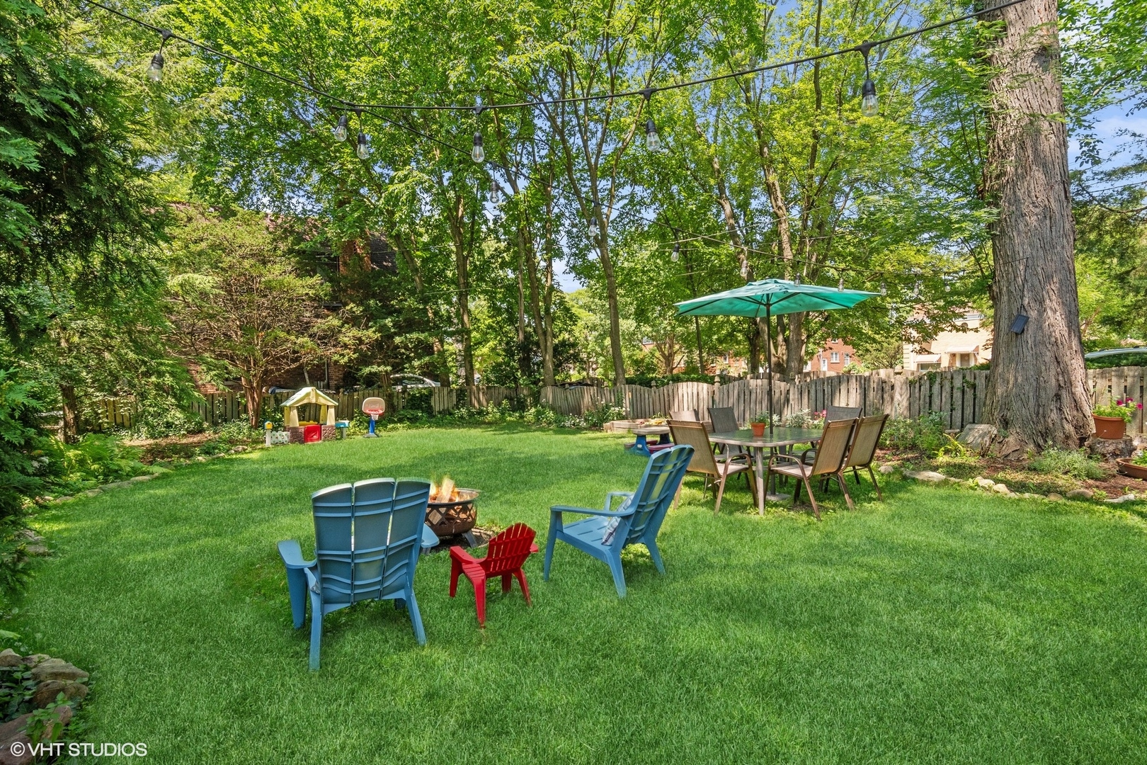 414 Audubon Road Riverside, IL 60546 - Photo 41 of 51 a view of a table and chairs in the garden