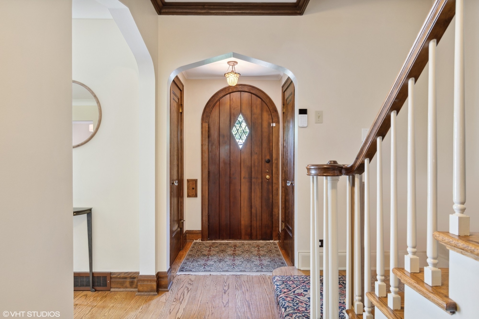 414 Audubon Road Riverside, IL 60546 - Photo 6 of 51 a view of a entryway door with wooden floor