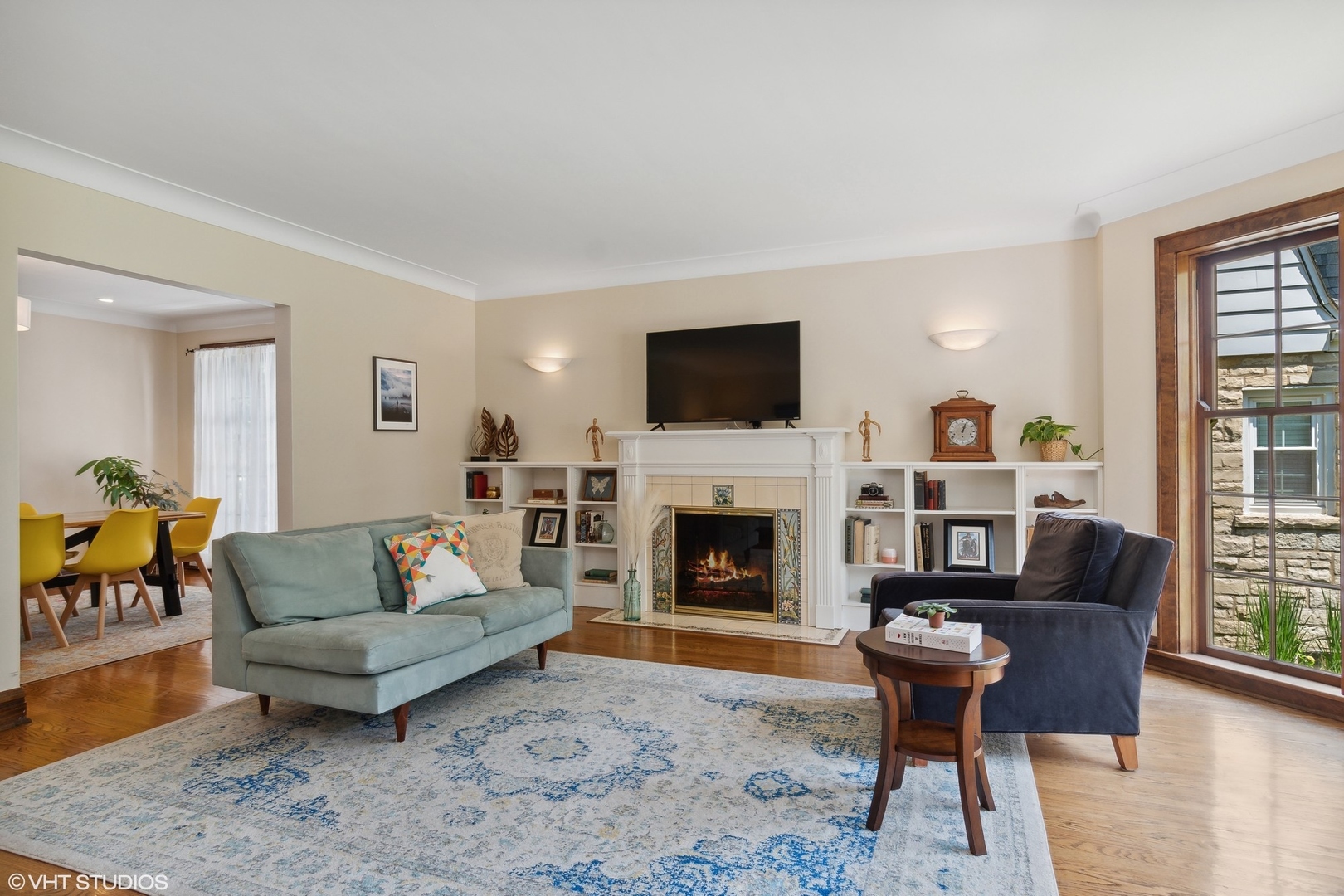 414 Audubon Road Riverside, IL 60546 - Photo 8 of 51 a living room with furniture and a fireplace