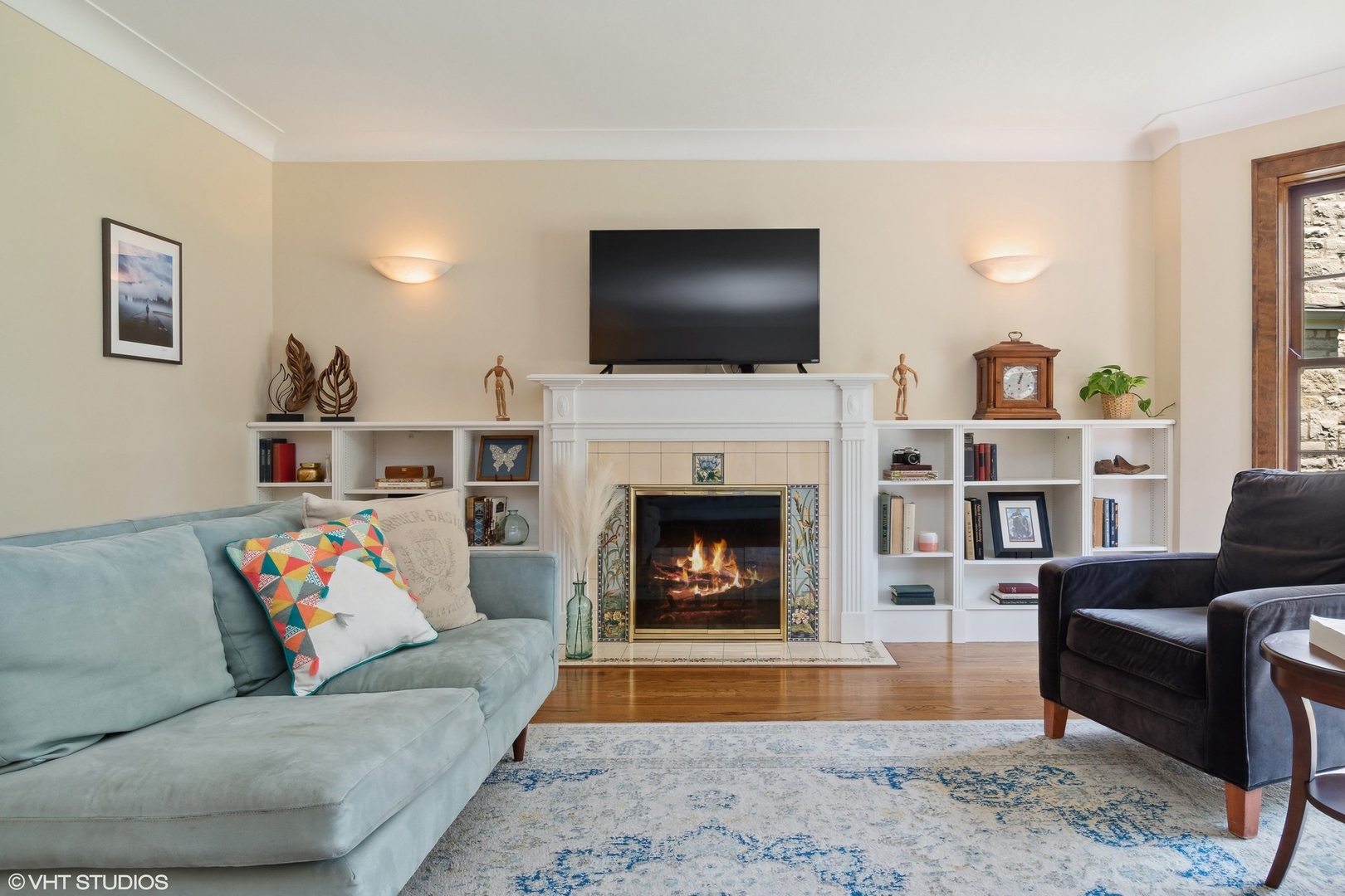 414 Audubon Road Riverside, IL 60546 - Photo 9 of 51 a living room with furniture fireplace and flat screen tv