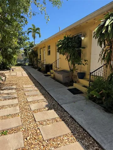 a view of a back yard of the house