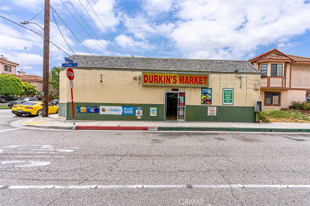 13809 Funston Avenue Norwalk, CA 90650 - Photo 16 of 16 front view of a building with a street