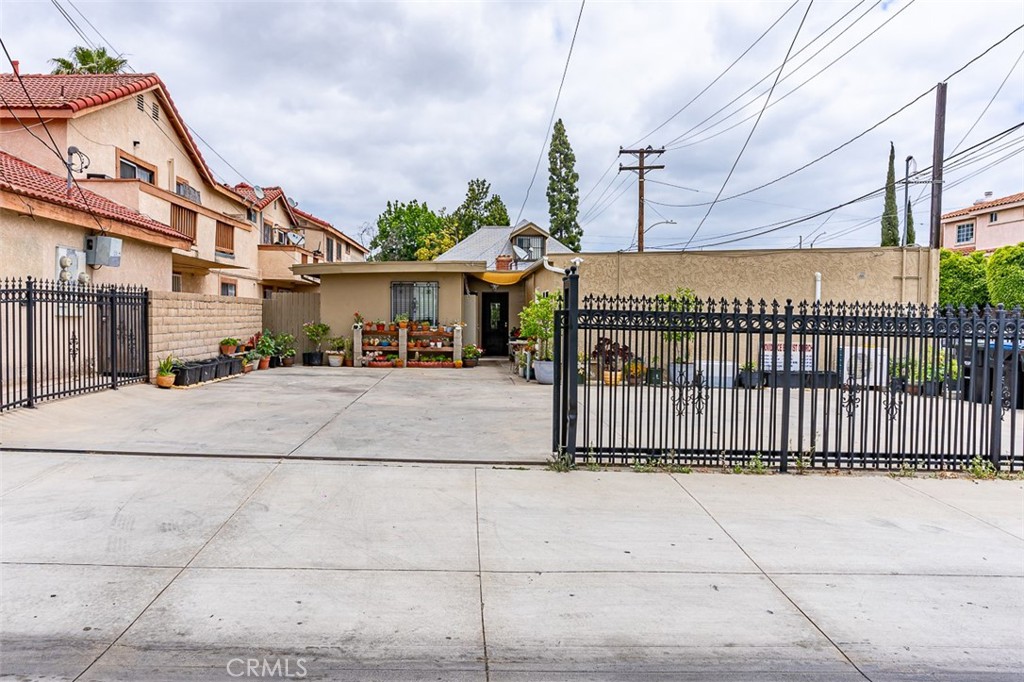 13809 Funston Avenue Norwalk, CA 90650 - Photo 7 of 16 a view of a building with a street