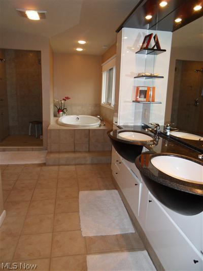 4865 Som Center Road Chagrin Falls, OH 44022 - Photo 11 of 22 Master glamour bath with granite and Jacuzzi tub!