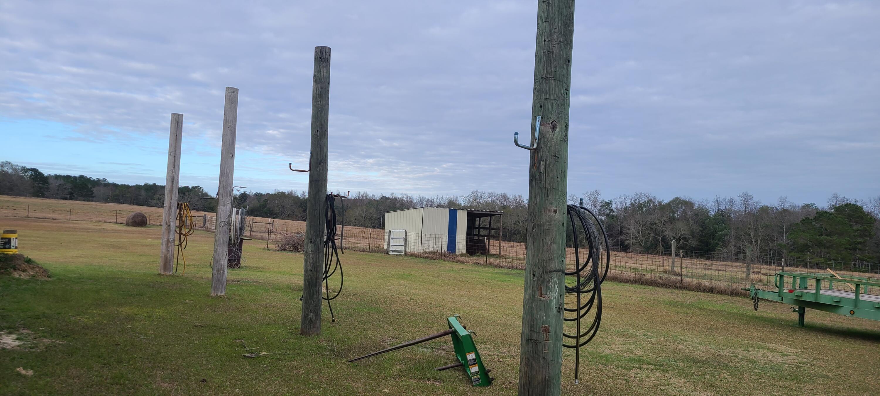 576 Perkins Road Laurel Hill, FL 32567 - Photo 45 of 70 Utility poles for hangings