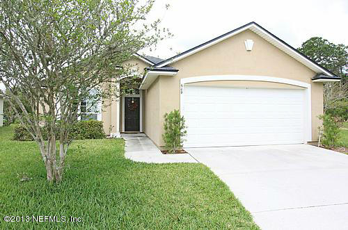 609 Racoon Court St. Johns, FL 32259 - Photo 1 of 32 a front view of a house with a yard