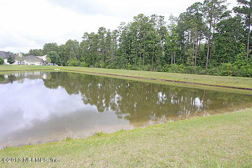 609 Racoon Court St. Johns, FL 32259 - Photo 17 of 32 a view of a lake from a yard