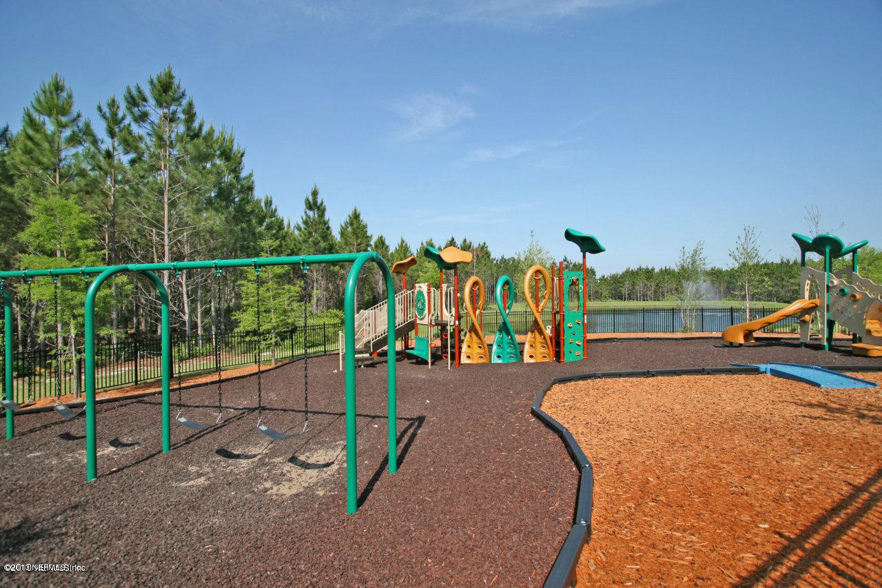 609 Racoon Court St. Johns, FL 32259 - Photo 27 of 32 a view of a park with swings