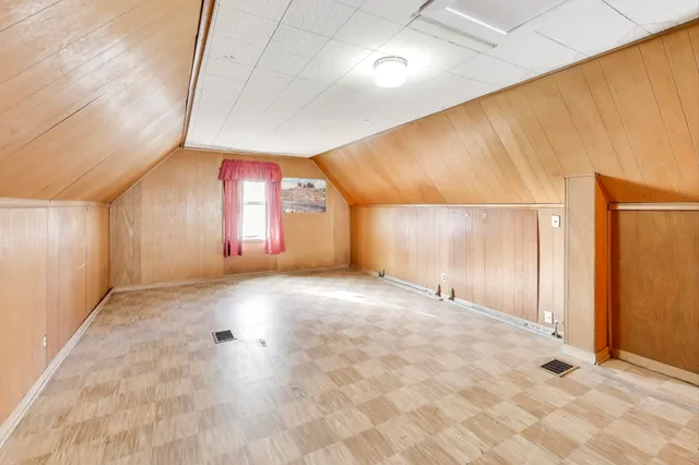 a view of a hallway with windows