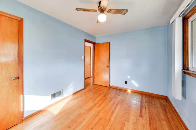 a view of an empty room and window