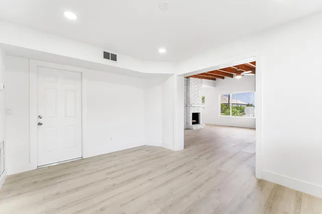 a view of livingroom with wooden floor