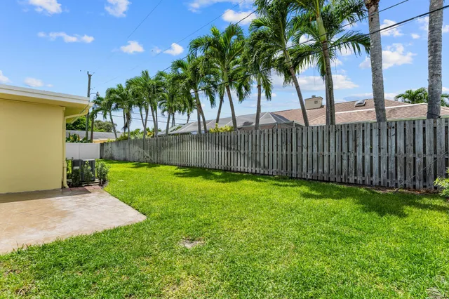 a view of a backyard with a garden