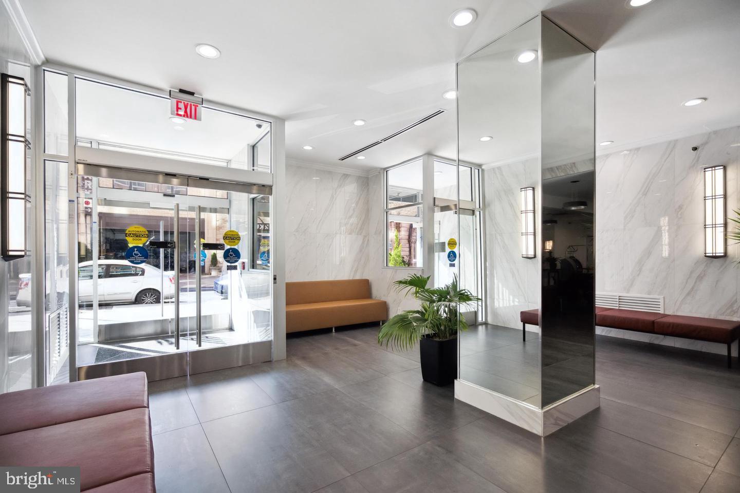 2101 Chestnut Street, Unit 1413 Philadelphia, PA 19103 - Photo 10 of 13 a room with furniture and a potted plant