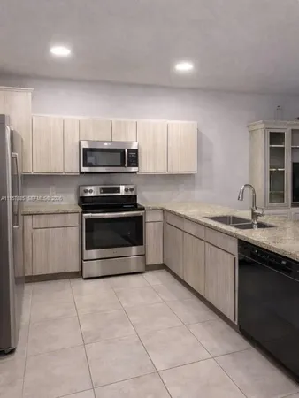 $510,000 | 9333 West 33rd Lane, Unit 9333, Hialeah Gardens, FL 33018