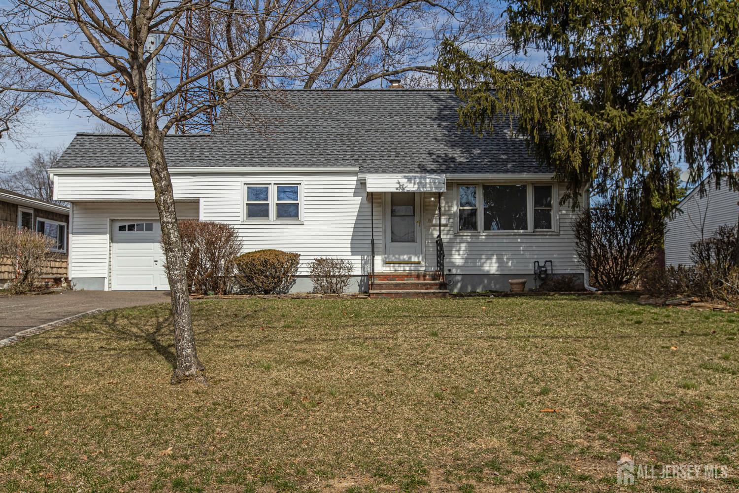 12 North Pennington Road New Brunswick, NJ 08901 - Photo 1 of 50 a front view of a house with garden