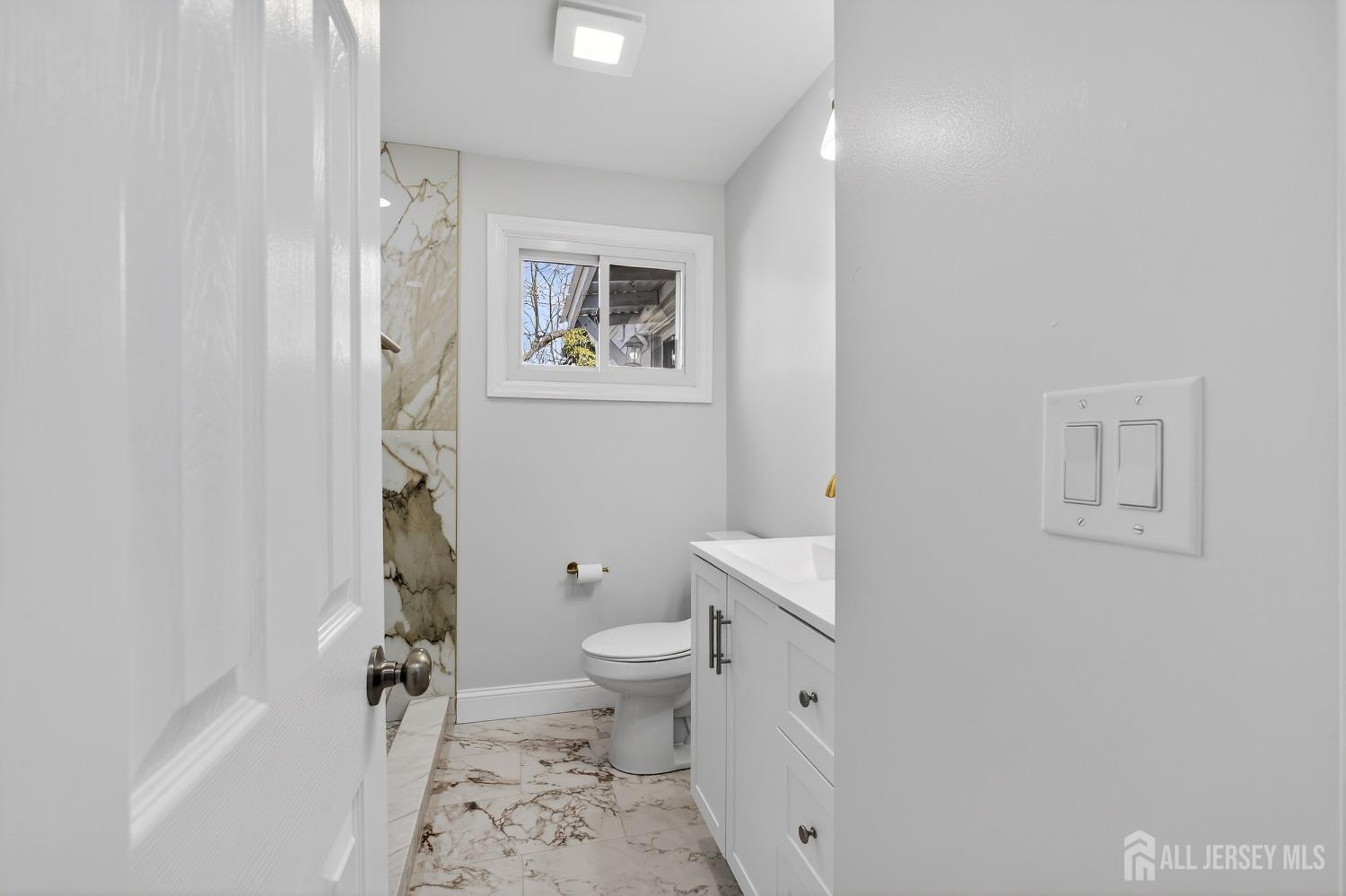 12 North Pennington Road New Brunswick, NJ 08901 - Photo 18 of 50 a bathroom with a toilet and a shower