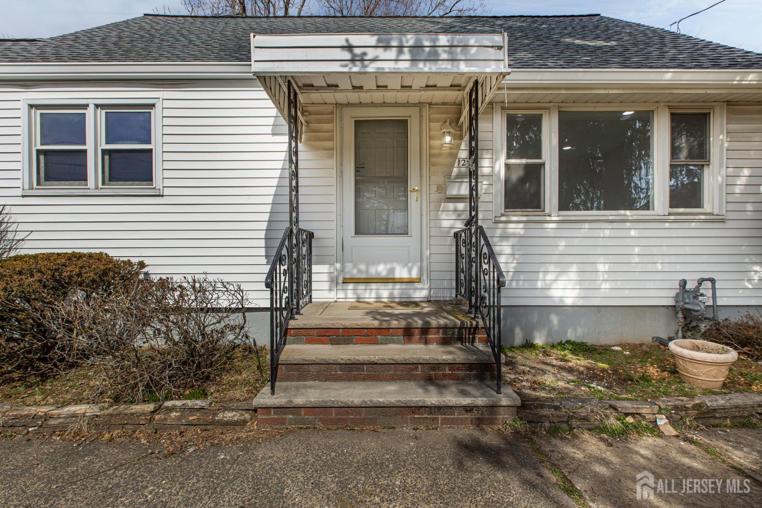 12 North Pennington Road New Brunswick, NJ 08901 - Photo 3 of 50 a front view of a house