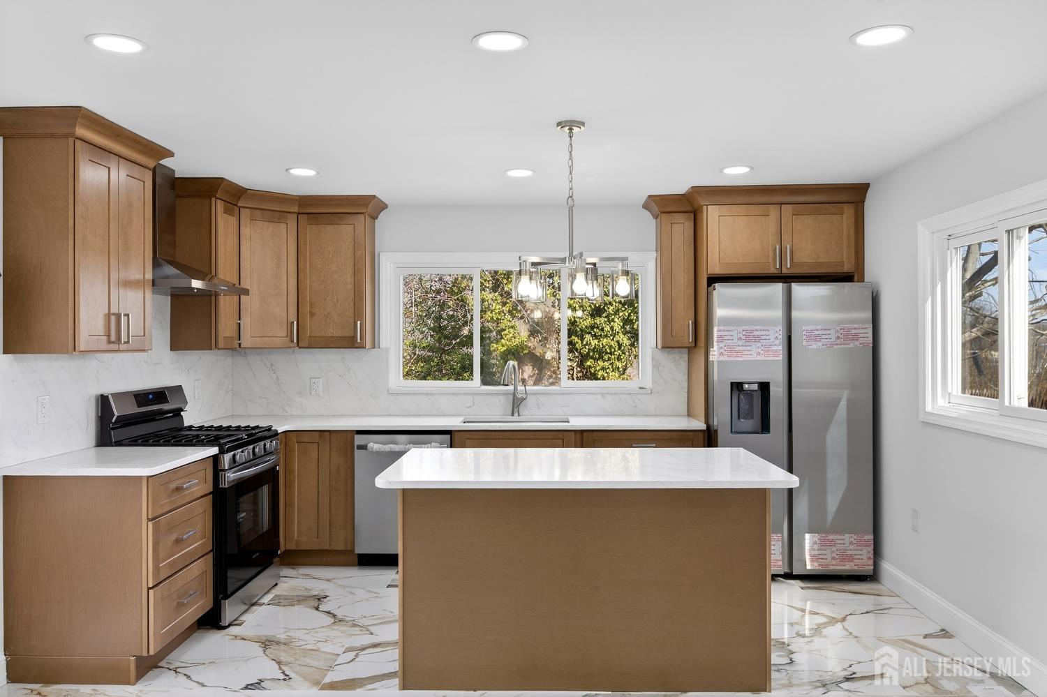 12 North Pennington Road New Brunswick, NJ 08901 - Photo 31 of 50 a kitchen with a sink stove and refrigerator