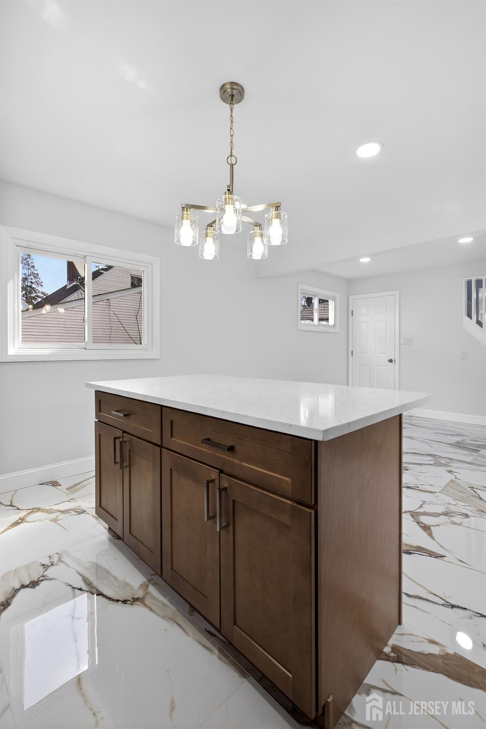 12 North Pennington Road New Brunswick, NJ 08901 - Photo 38 of 50 a spacious bathroom with a double vanity sink and a mirror