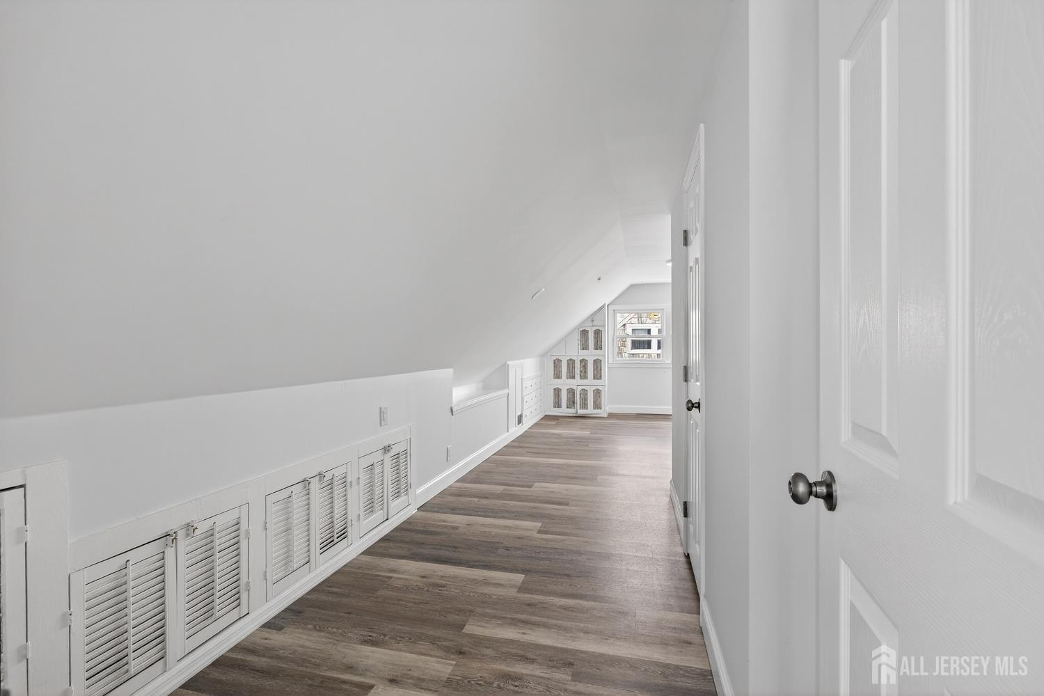 12 North Pennington Road New Brunswick, NJ 08901 - Photo 39 of 50 a view of a hallway with wooden floor