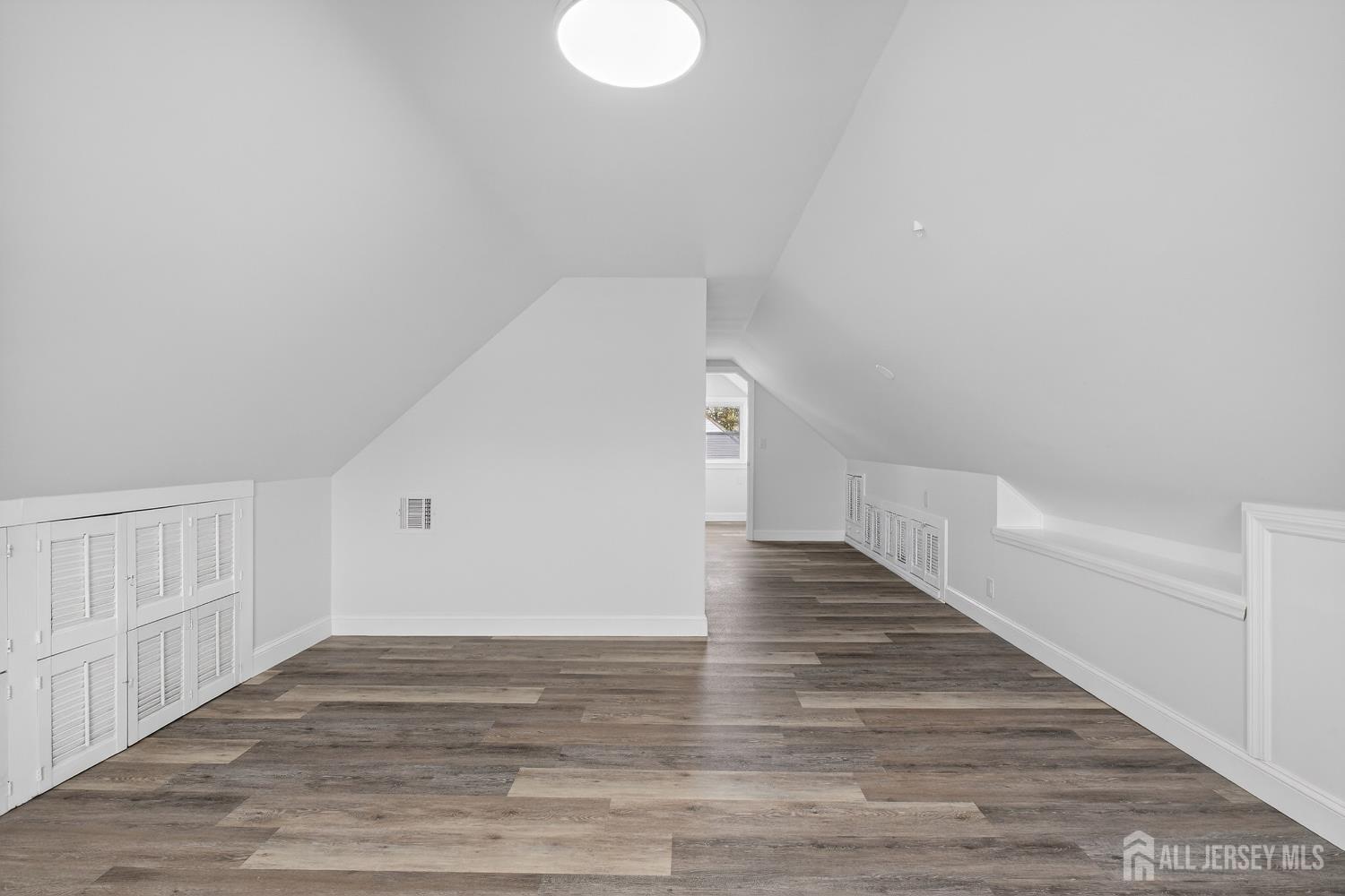 12 North Pennington Road New Brunswick, NJ 08901 - Photo 41 of 50 a view of a hallway with wooden floor