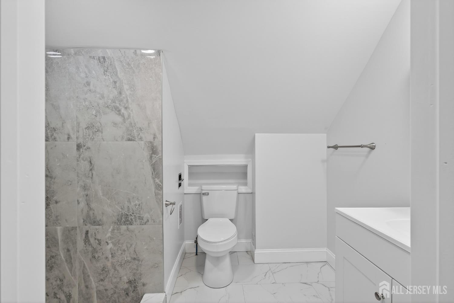 12 North Pennington Road New Brunswick, NJ 08901 - Photo 42 of 50 a bathroom with a toilet and a shower