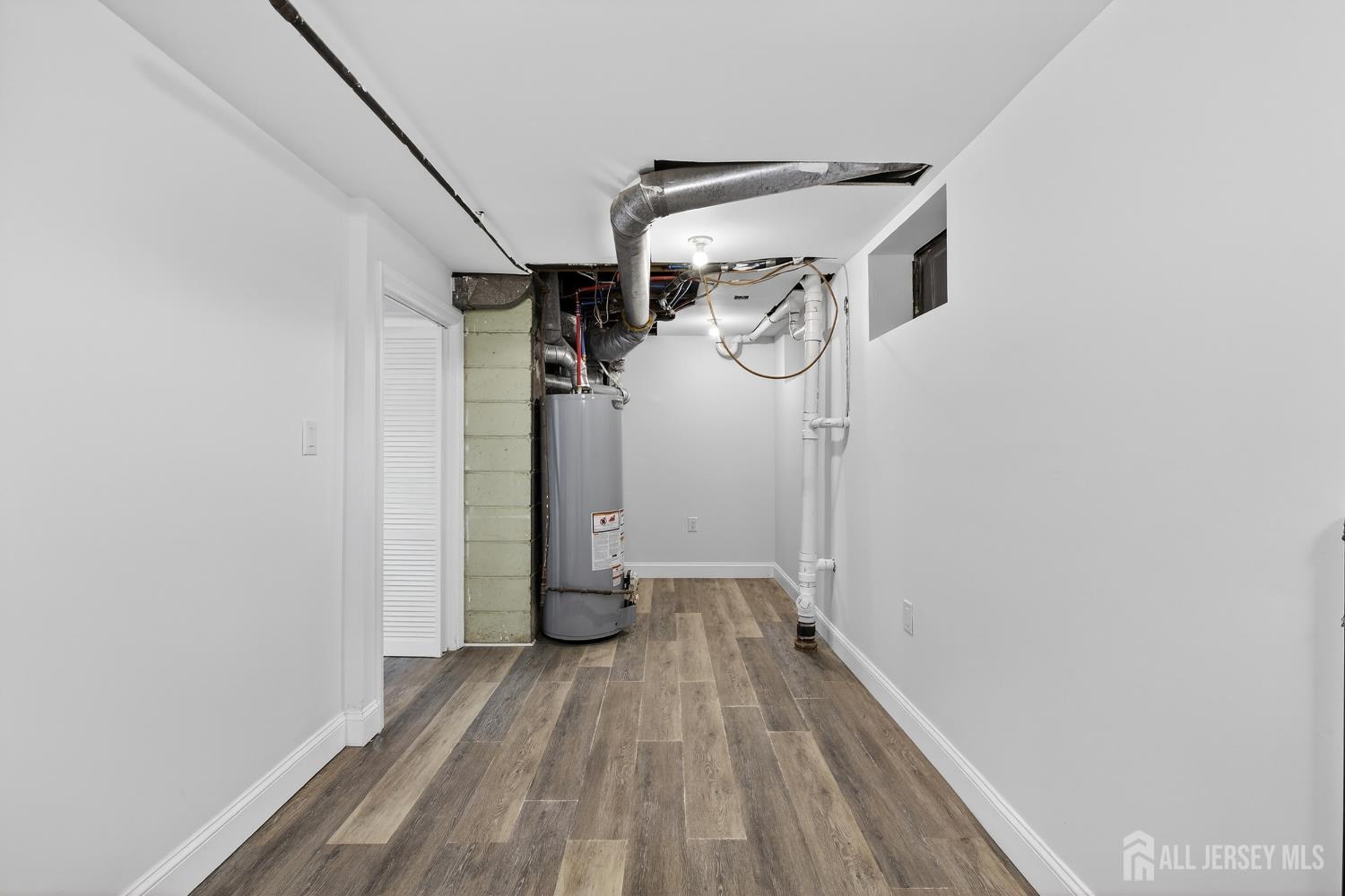 12 North Pennington Road New Brunswick, NJ 08901 - Photo 50 of 50 a view of a storage & utility room with a washer