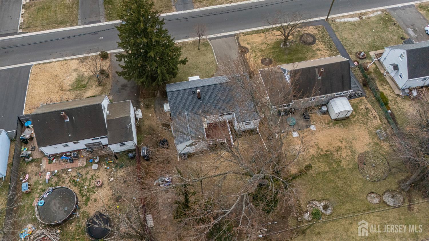 12 North Pennington Road New Brunswick, NJ 08901 - Photo 10 of 50 a backyard of a house with table and chairs
