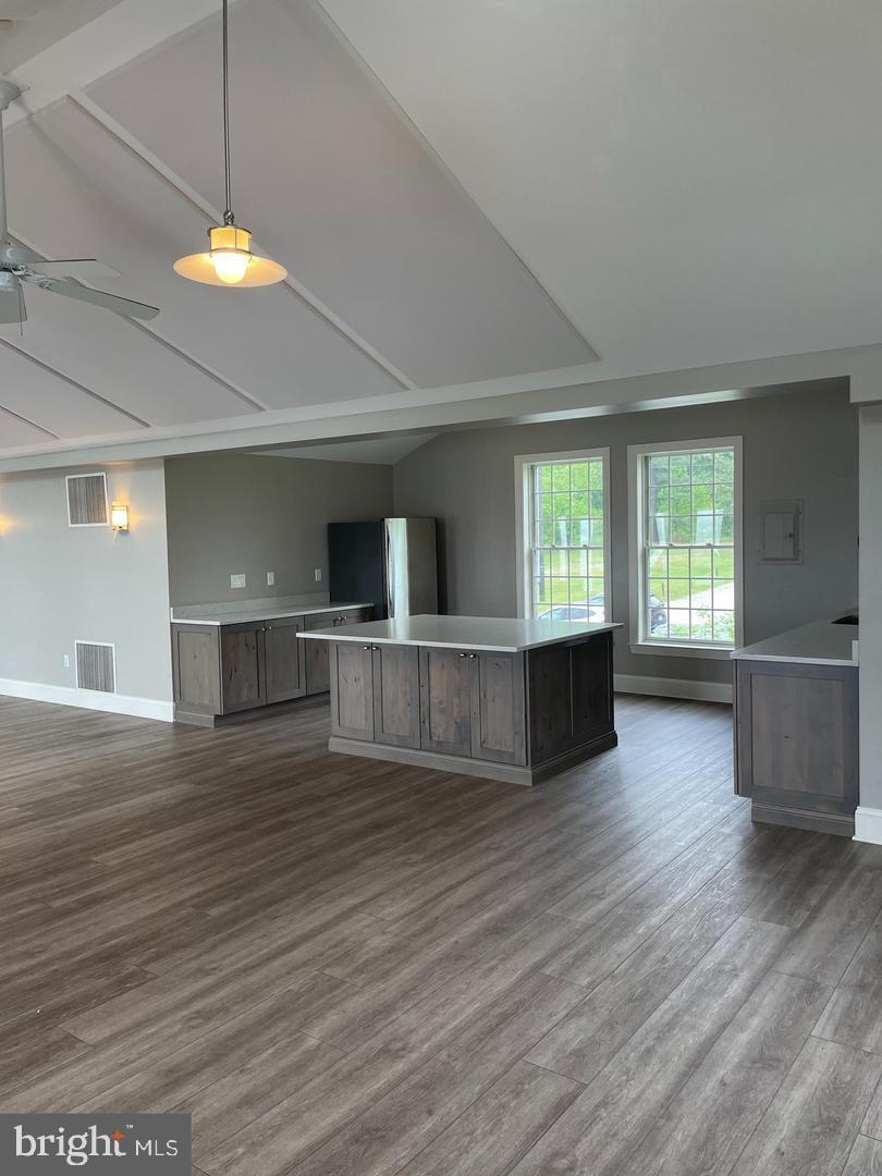 54 Decatur Avenue Annapolis, MD 21403 - Photo 32 of 63 a view of a kitchen with wooden floor and a window