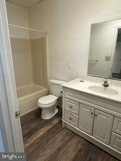 21614 Great Mills Road, Unit 104 Lexington Park, MD 20653 - Photo 13 of 17 a bathroom with a sink a toilet and a shower