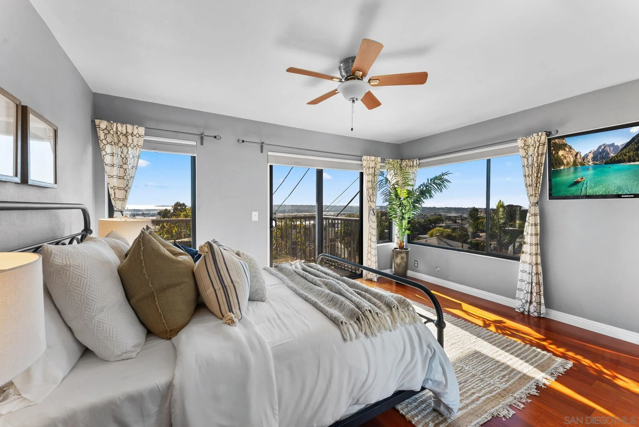 1670 Guy Street, Unit B San Diego, CA 92103 - Photo 14 of 44 a bedroom with a bed and a large window