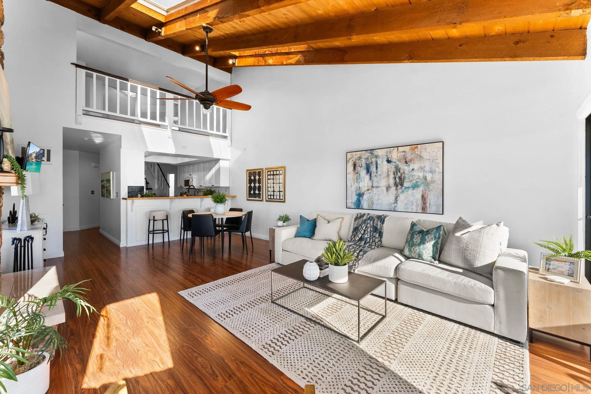 1670 Guy Street, Unit B San Diego, CA 92103 - Photo 6 of 44 a living room with furniture and a rug