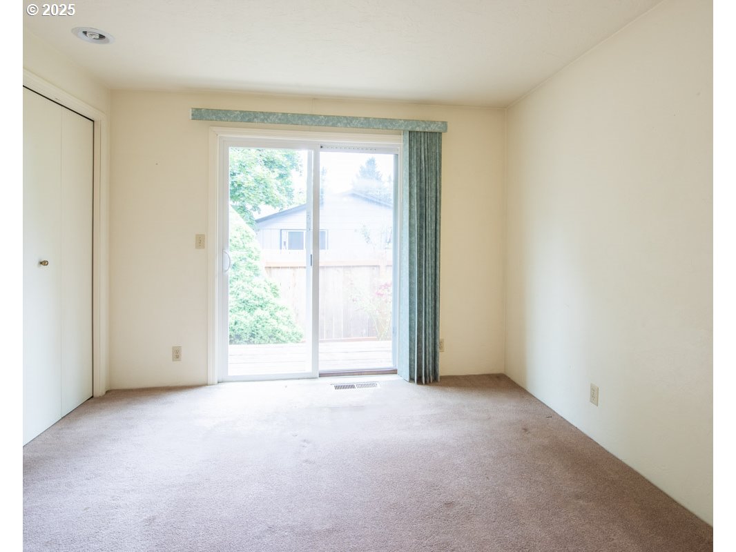 4631 Daisy Street Springfield, OR 97478 - Photo 18 of 46 a view of an empty room with a window